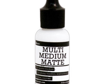 May include: A white bottle with a black cap and label. The label reads "MULTI MEDIUM MATTE" and includes information about the product, such as "quality medium" and "for gluing, transfers, sealing & more".