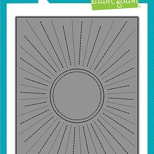 May include: A die-cutting template for a sunburst design with a circle in the centre. The template is made of metal and has a grey finish. The text "lawn cuts" and "custom craft dies" is at the top of the image. The text "lawn fawn" is at the top right of the image. The text "Sunburst Backdrop © Lawn Fawn" is at the bottom of the image.