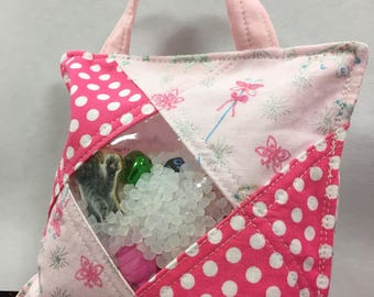 Treasure Bag filled with 30 little surprises. I spy bag great for sensory seekers.