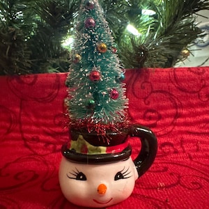 Adorable Mini Snowman Mug with Decorated Bottle Brush Tree