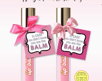 May include: Two pink lip balm tubes with gold caps and pink bows, each with a tag that reads "In case you didn't know, you are the BALM." The image also includes the text "Lip Balm Printable Tag."