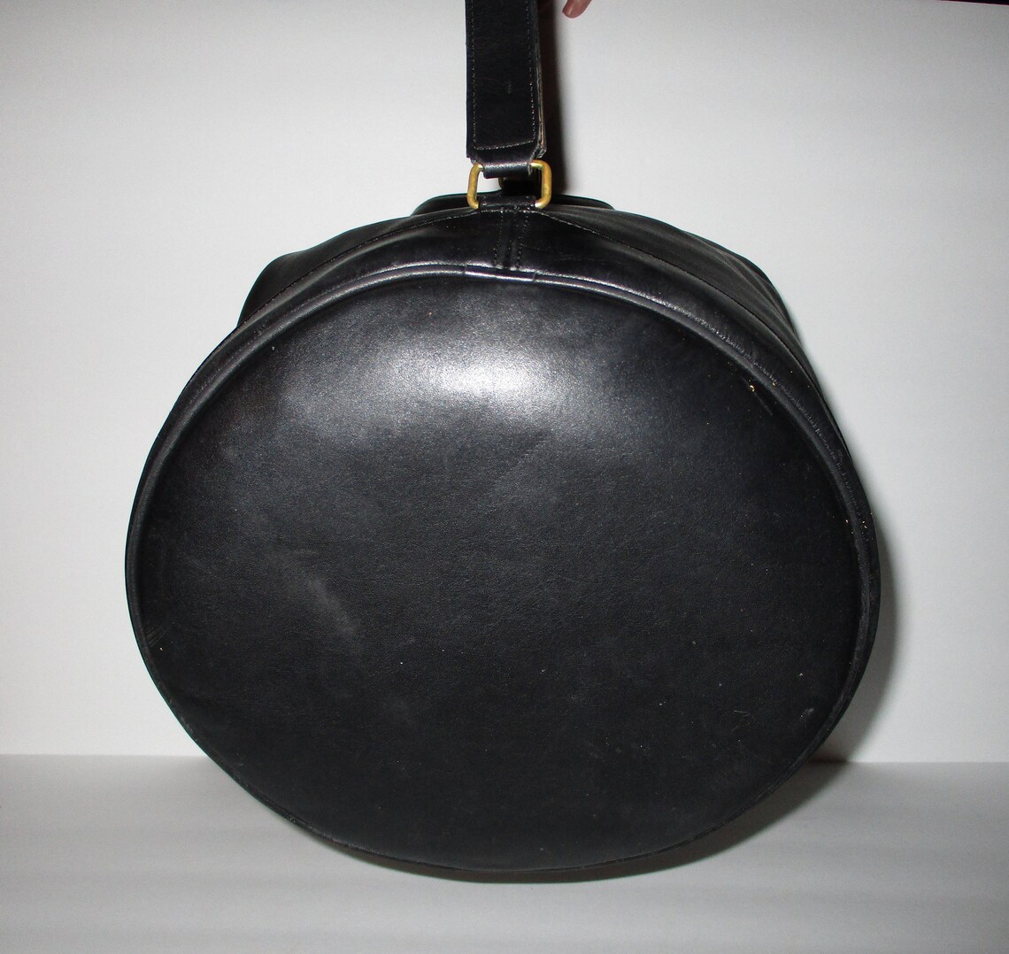 top handle sling bag