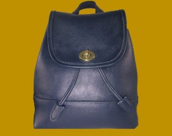 navy blue coach backpack