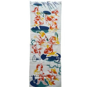 May include: A white fabric panel with a colorful design of frogs and fish. The frogs are in various poses, some holding umbrellas, and the fish are swimming in a pond. The design is in shades of red, orange, yellow, green, and blue.