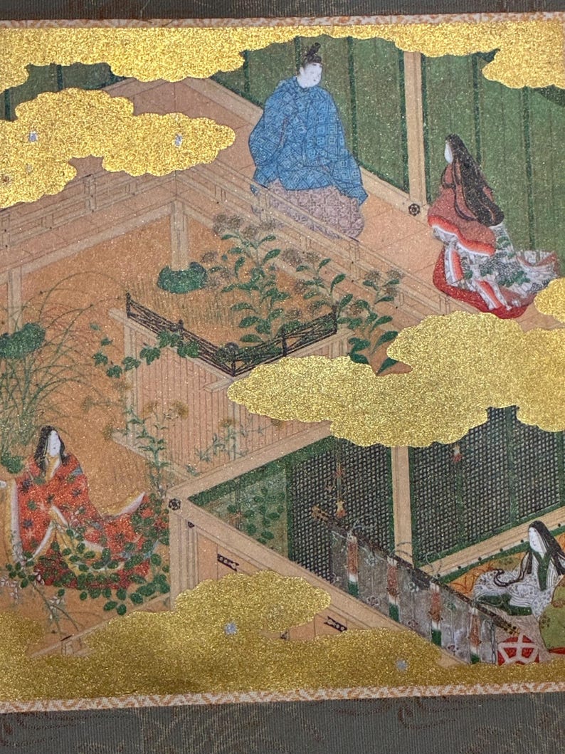 May include: An antique Japanese painting depicting figures in traditional attire within a detailed architectural setting. The artwork features gold leaf accents, with figures in red, blue, and white garments. The scene is set amidst a garden with green foliage.