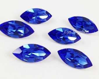 4228 ZAFIRO 15 x 7 mm 4 piezas Cristal Swarovski XILION Navette con reverso laminado Azul oscuro