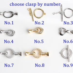 May include: Nine different jewelry clasps are displayed, each labeled with a number. The clasps vary in style, including toggle, lobster claw, and ring clasps. Some are silver-toned, others gold-toned, and some are embellished with clear crystals. The text "choose clasp by number" is at the top.