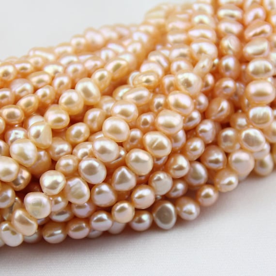 Wholesale Natural Cultured Freshwater Pearl Strands 