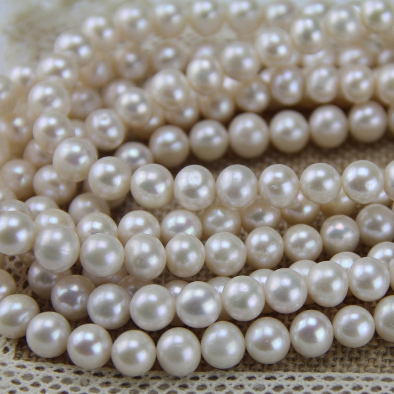 9mm AA ivory white potato pearl strand,near round freshwater pearl bead string wholesale China,real pearl necklace material finding supply