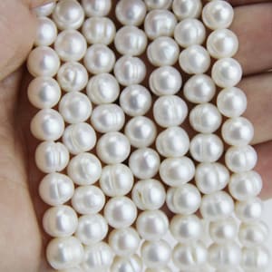 7-8mm white pearl strand,freshwater potato near round pearls,pink pearl beads wholesale,large hole pearls 1.0mm,1.5mm,1.8mm,2.0mm,2.2mm,