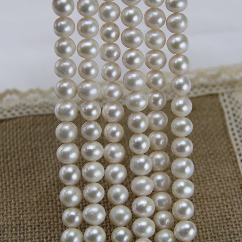 9mm AA ivory white potato pearl strand,near round freshwater pearl bead string wholesale China,real pearl necklace material finding supply