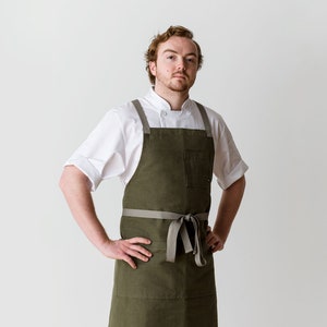 Cross back chef apron for men and women | Olive canvas with Tan Straps and pockets | Kitchen, baking, BBQ | Professional quality