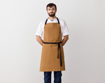 Apron for men with pockets | Ochre with Black Straps | Chefs, bakers, BBQ | Hand-loomed, Cotton canvas | Kitchen, Restaurant, Professional