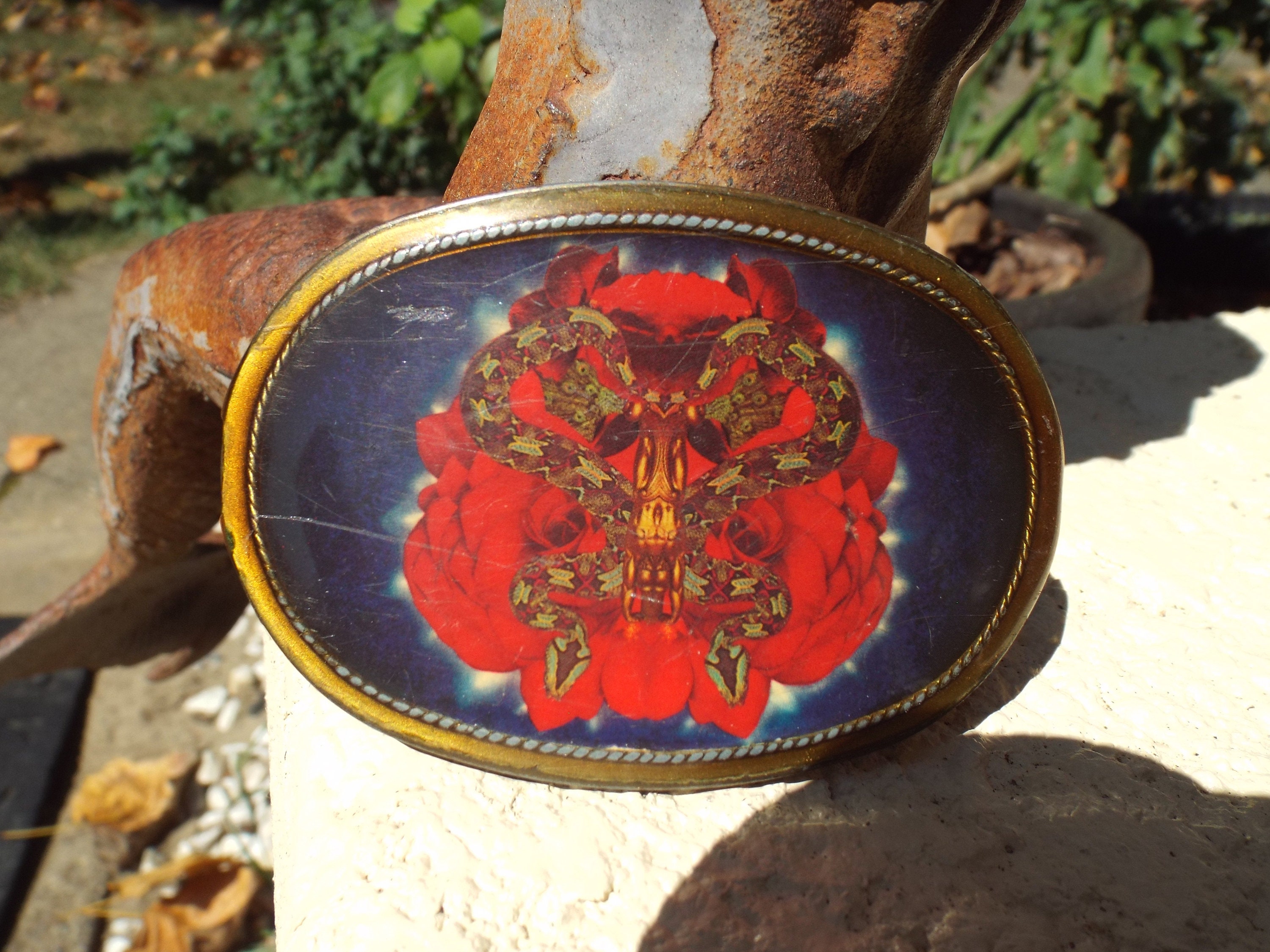 Pacifica belt buckles top
