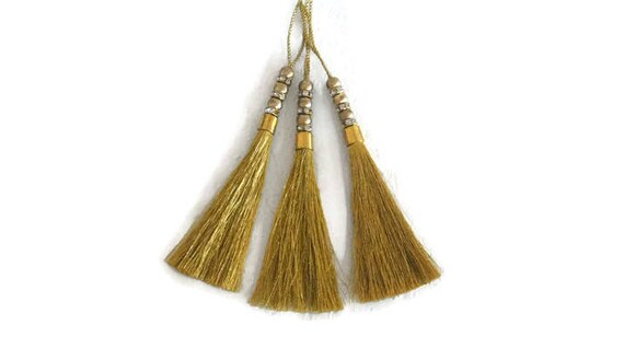 gold tassel sandals