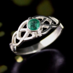 Celtic Ring, ladies sterling silver Irish knot ring, with green stone.