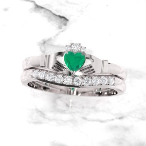 Claddagh ring set. Emerald Claddagh ring. Diamond and emerald claddagh ring with complimenting gently curved diamond wedding band.
