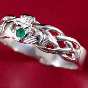 Emerald Claddagh ring, ladies claddagh ring on celtic rope band.