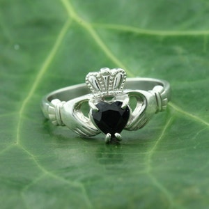 Claddagh ring, ladies black sapphire claddagh ring, set with a natural sapphire gemstone.