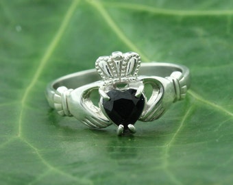 Claddagh ring, ladies black sapphire claddagh ring, set with a natural sapphire gemstone.