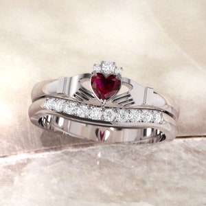 Claddagh ring set. Ruby Claddagh ring, crafted in Ireland. Diamond and Ruby claddagh ring with matching curved diamond wedding ring.