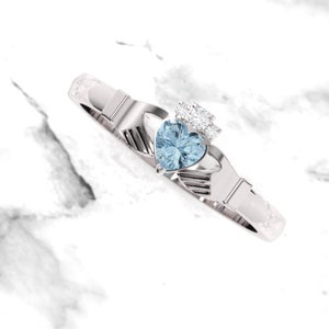 Blue topaz gemstone Claddagh ring, crafted in Ireland. Diamond and topaz claddagh ring. Irish ring.