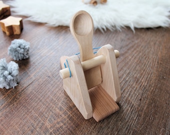 Wooden catapult, science experiment, educational toy, fun game, recycled wood