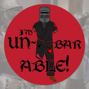 May include: A red circle with the text "I'm Un-Bar Able!" in black. A black and grey knight in armor is standing in the center of the circle.