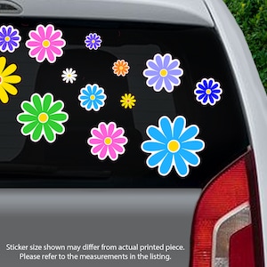 May include: A car window with a variety of colorful daisy stickers. The stickers are in different sizes and are arranged in a random pattern. The stickers are a great way to add a touch of personality to a car.
