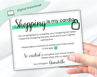May include: A white card with green text that reads "Shopping is my cardio". The card has a small shopping bag icon and a thumbs up icon. The text also says "I am so delighted to complete your shopping list today! I hope this shopping trip was received to your highest satisfaction. Please take a moment to review your final receipt in the app. So excited to complete your future orders! Please shop with us again. Your Shopper Annebelle."