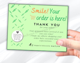 May include: Green card with a shopping cart icon and the text "Smile! Your order is here! Thank you for your order! Your groceries have arrived & now you can relax! I hope my efforts shopping your order have exceeded your expectations. Shopped & Delivered By: KAITLYN"