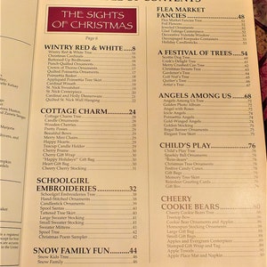 May include: A table of contents for a book about Christmas crafts. The book features a variety of crafts, including ornaments, trees, angels, and cookie bears. The table of contents is organized by category, with each category listed in bold text. The book is titled "The Sights of Christmas".