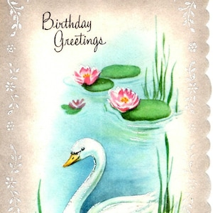 May include: A vintage birthday card with a white swan swimming in a pond with pink water lilies and green lily pads. The card has a white border with a floral design and the text "Birthday Greetings".
