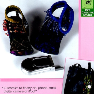 May include: Three different sized bags made from fabric. The bags are designed to hold a cell phone, small digital camera or iPod. The bags are decorated with different patterns and colors. The text "Pocketbook Pals" is at the top of the image.