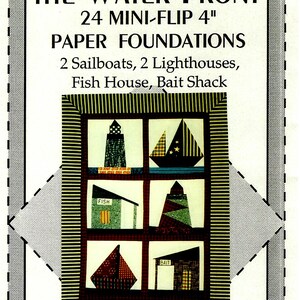 May include: A pattern packet titled Set 3 - On The Water Front, featuring 24 mini-flip 4 inch paper foundations for quilting. The cover displays six blocks showing sailboats, lighthouses, a fish house, and a bait shack with text by Eileen's Design Studio.