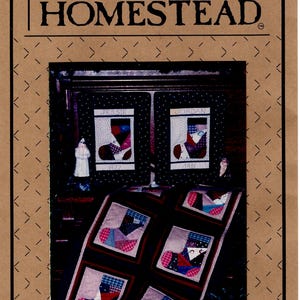 May include: A brown paper pattern with a black border and a white star and heart pattern. The text "LIBERTY HOMESTEAD" is printed in black at the top. A photo of a quilt with a patchwork design of red, blue, and white stockings is in the center. The stockings are labeled with names and dates.