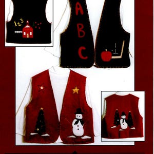 May include: A reversible felt vest with two designs. One side features a red schoolhouse with the numbers 123 and the other side features the letters A, B, and C with a red apple and a ruler. The vest is black on one side and red on the other.