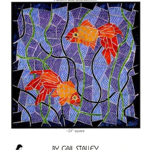May include: A pattern and instructions document titled Mosaic Goldfish by Gail Stalley. The cover features a quilt design with two orange goldfish swimming among green seaweed against a blue mosaic background, measuring approximately 24 inches square.