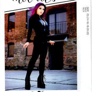 May include: A black jumpsuit with a zipper down the front and long sleeves. The model is wearing black platform boots and has pink hair. The image is from McCall's pattern R10671, size E5 (14-16-18-20-22).