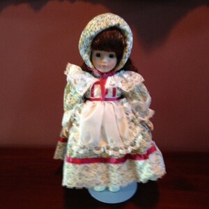 a christmas prayer porcelain doll