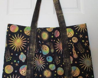 Eye catching CELESTIAL print tote bag with suns, moons, stars, comets in varigated pastel shades on black -lots of  gold accents 15" x 19"
