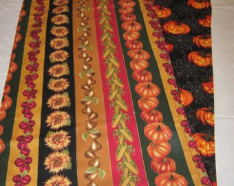 FALL and HALLOWEEN  REVERSIBLE table runner 50-64" long rows of autumn harvest with Halloween print of pumpkins, webs on black