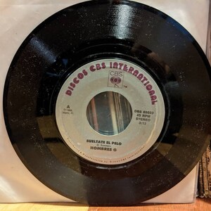 Hombres G - Suéltate El Pelo (7&quot; Single) (45 RPM)- Vinyl