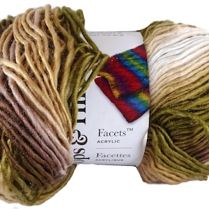 May include: A skein of acrylic yarn in shades of green, brown, and beige. The yarn is thick and textured, with a label that reads "Facets Acrylic". The label also features a colorful, striped design.
