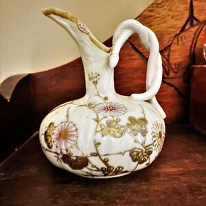 Vintage Small Porcelain Pitcher with Raised Floral Design and Twisted Handle Asian Pitcher
