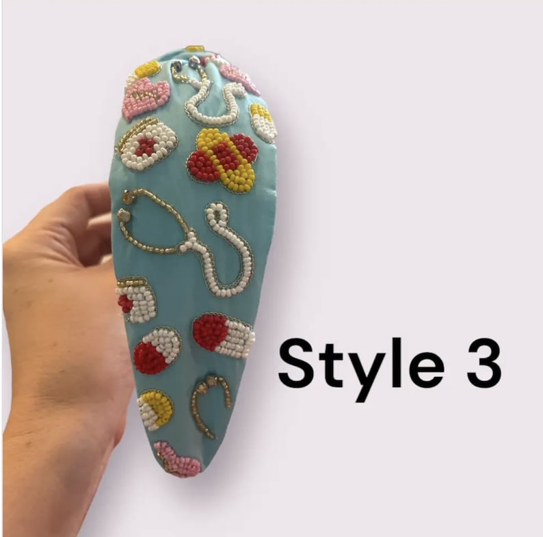 May include: A light blue headband with a beaded design featuring medical symbols like pills, stethoscopes, and bandages. The headband is decorated with red, yellow, white, and gold beads. The text "Style 3" is visible in the image.