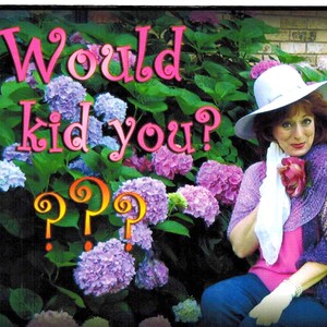 May include: Image featuring the text "Would I kid you?" in pink letters with a white outline, and question marks in orange. The text is set against a backdrop of purple and blue hydrangeas and a woman wearing a hat.