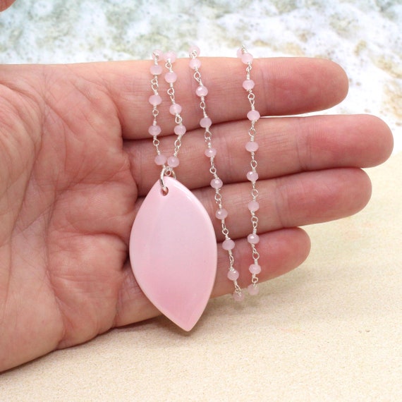 Pink conch shell best sale necklace
