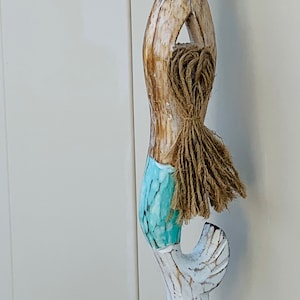 Carved and painted handcrafted wooden mermaids with seagrass hair | Seagrass Rope, Driftwood, and Stone Accents