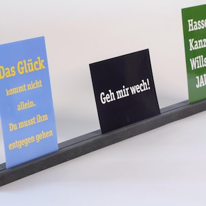 Kaartenstandaard in zwart 60 cm voor visitekaartjes, gastenkaarten, foto's, afbeeldingen, basisprijs 30 euro per meter